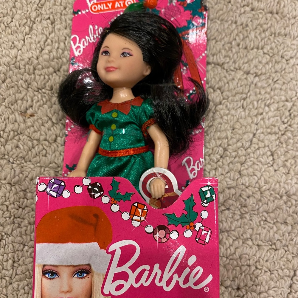 - Christmas holiday barbie kelly doll